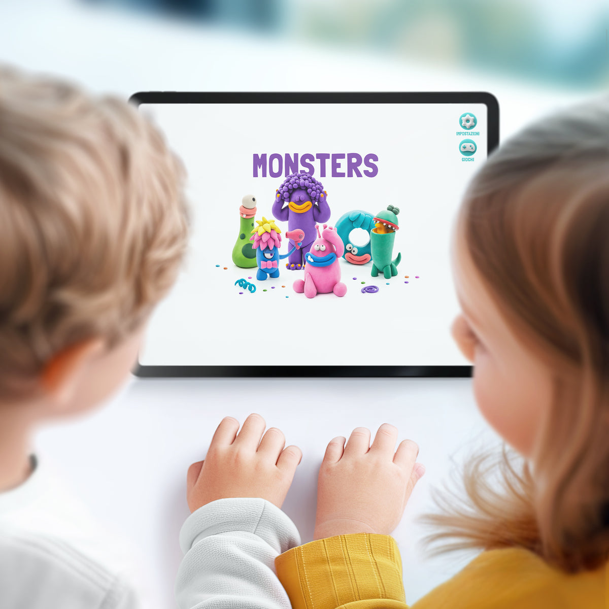 Hey Clay Monsters app weergave op tablet, kinderen bekijken monsters knutselen instructies tijdens speelmoment