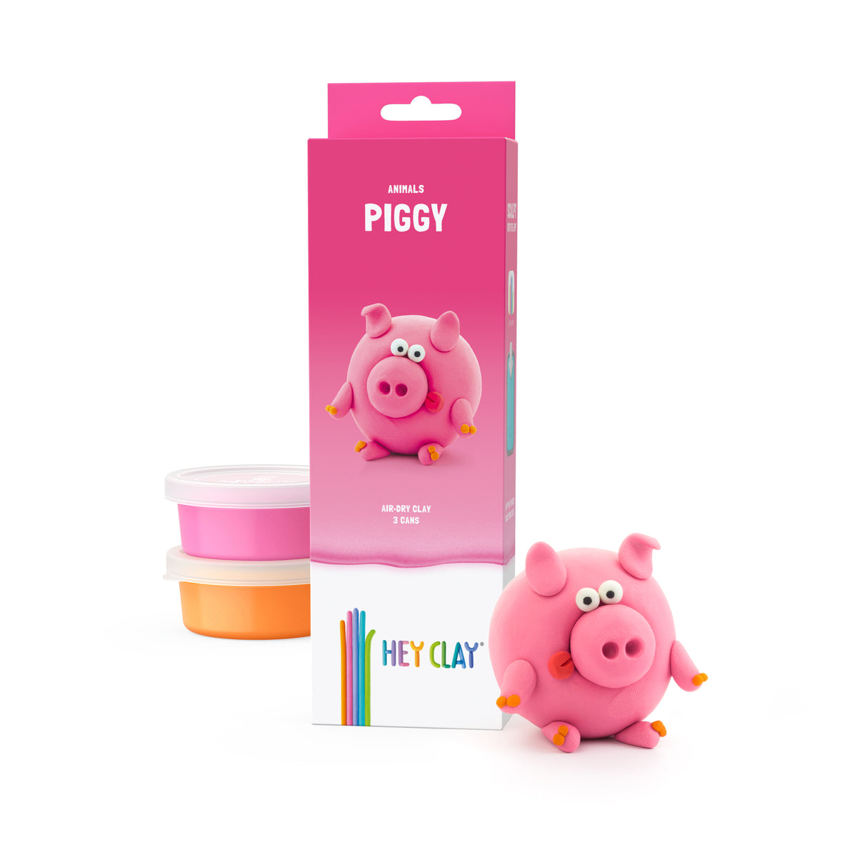 Hey Clay speelgoed set met roze varkentje en 3 potjes boetseerklei, kleurrijke verpakking zichtbaar