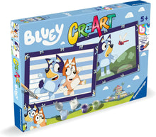 Voorkant verpakking Ravensburger CreArt Bluey schilderpakket met Bluey en Bingo, leuk cadeau en knutsel idee vanaf 5 jaar.
