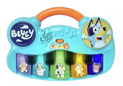 Compact Bluey keyboard met vijf vrolijke figuren en lichtgevende toetsen, veilig muziek speelgoed voor peuters.
