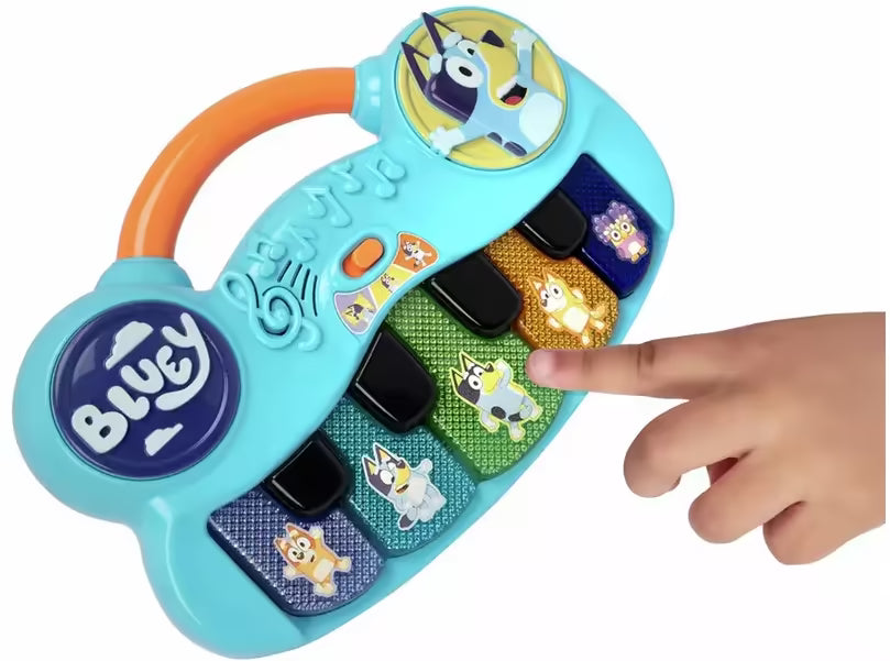 Blauw Bluey keyboard met kleurrijke toetsen en Bluey figuren, kindvriendelijk peuter speelgoed met muziek.