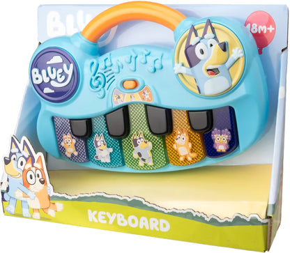 Bluey keyboard in doos met muzieknotities en figuren, veilig peuter speelgoed met vrolijke piano toetsen.