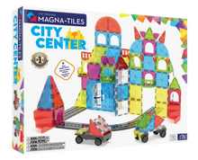 Voorkant doos van Magna Tiles City Center set met 110 kleurrijke magneet bouwstenen en speelinspiratie.