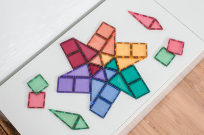Connetix magneet tegels bovenaanzicht vliegtuigvorm met driehoeken en vierkanten in pasteltinten