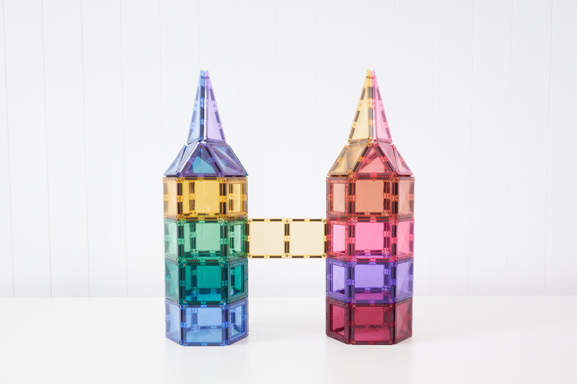 Connetix magneten speelgoed torens met pastel kleurverloop van groen naar roze en paars bouwen