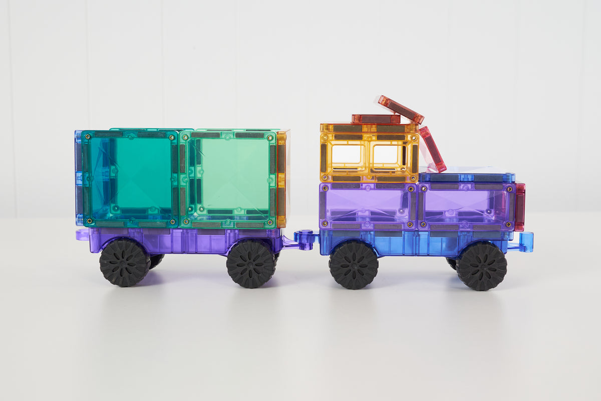 Connetix Motion Pack pastel trein met aanhanger in turquoise, paars en geel, volledig zijaanzicht