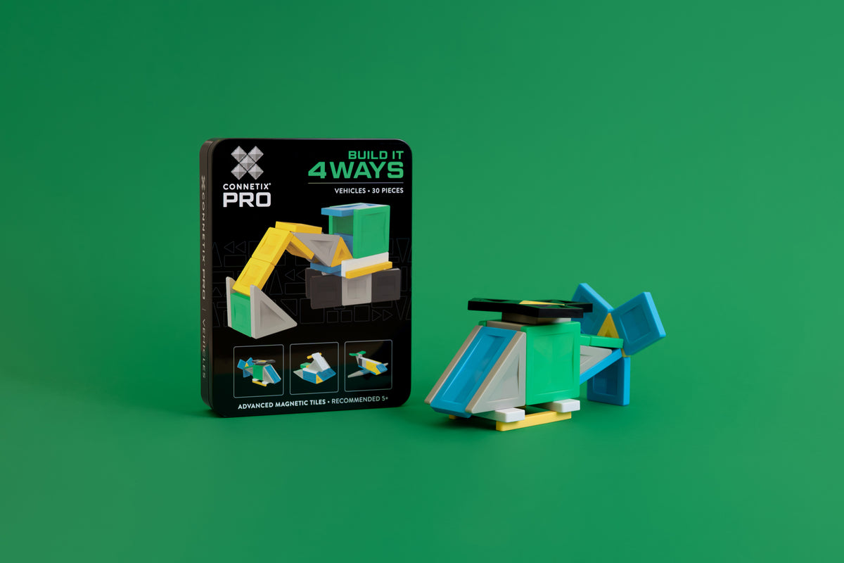 Connetix PRO Build It 4 Ways helikopter met Smart Spin technologie naast zwarte verpakking groen