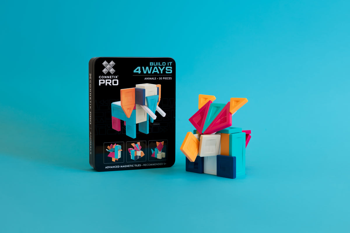 Connetix PRO magneet speelgoed met kleurrijke vogel figuur naast zwarte verpakking op blauw