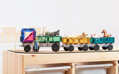 Connetix tiles boerderijtrein met lama schapen paard boer magnetisch speelgoed pastel kleuren houten tafel
