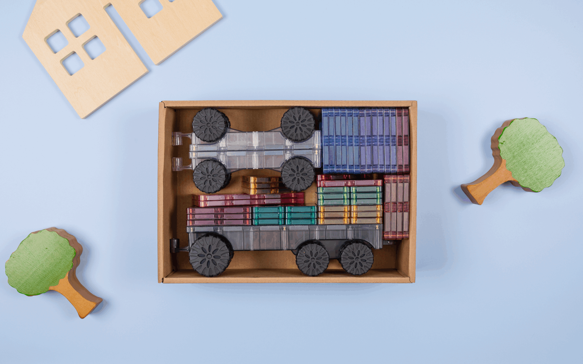 Connetix Transport Pack bovenaanzicht open doos met pastel magneet tegels en wielen voor kinderen
