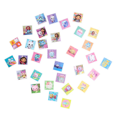 Losse Gabby’s poppenhuis memory kaarten van Ravensburger verspreid op tafel, vrolijk en kindvriendelijk ontwerp voor spelplezier.