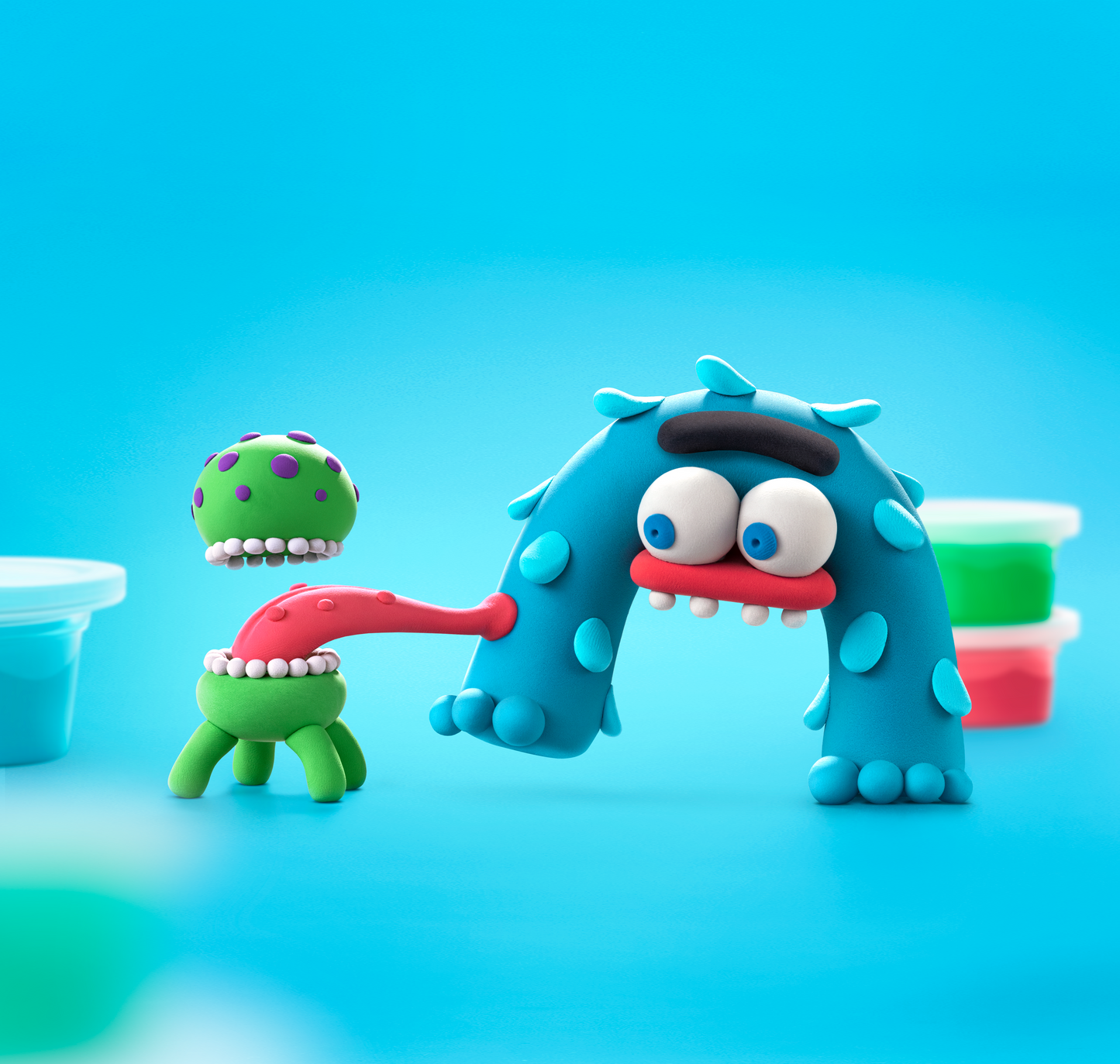 Hey Clay Aliens figuren Burger en Bigfoot met kleurrijke potjes boetseerklei blauwe achtergrond
