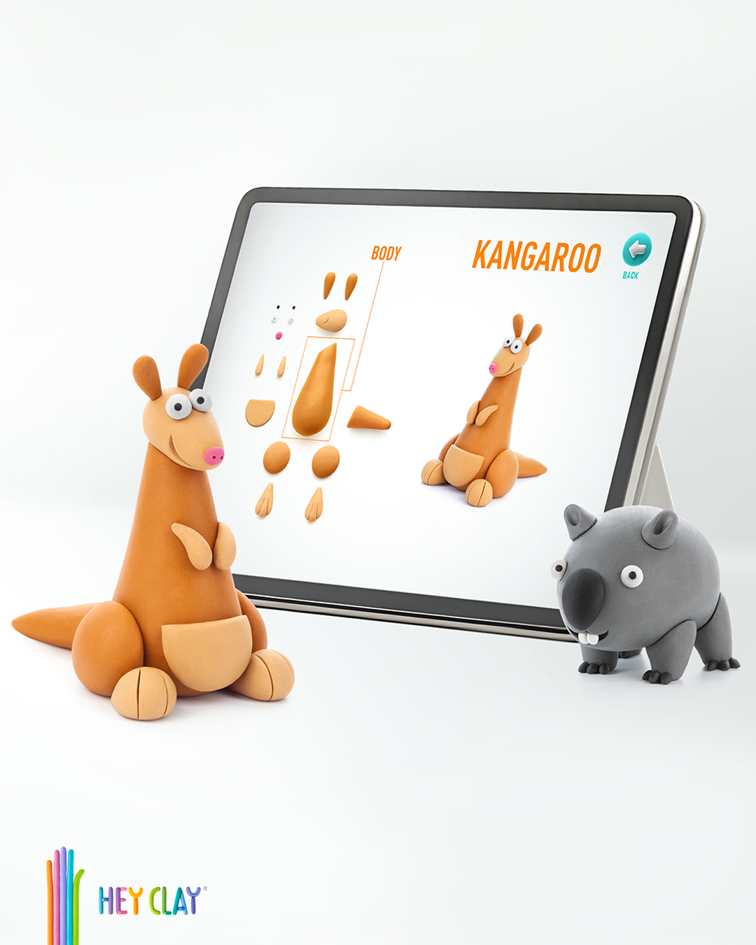 Hey Clay app instructies kangoeroe kleien op tablet met boetseerklei figuren en wombat naast scherm