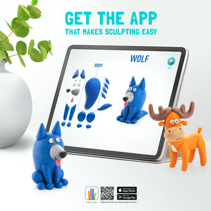Hey Clay app op tablet toont wolf bouwinstructies met eland en wolf kleien figuren