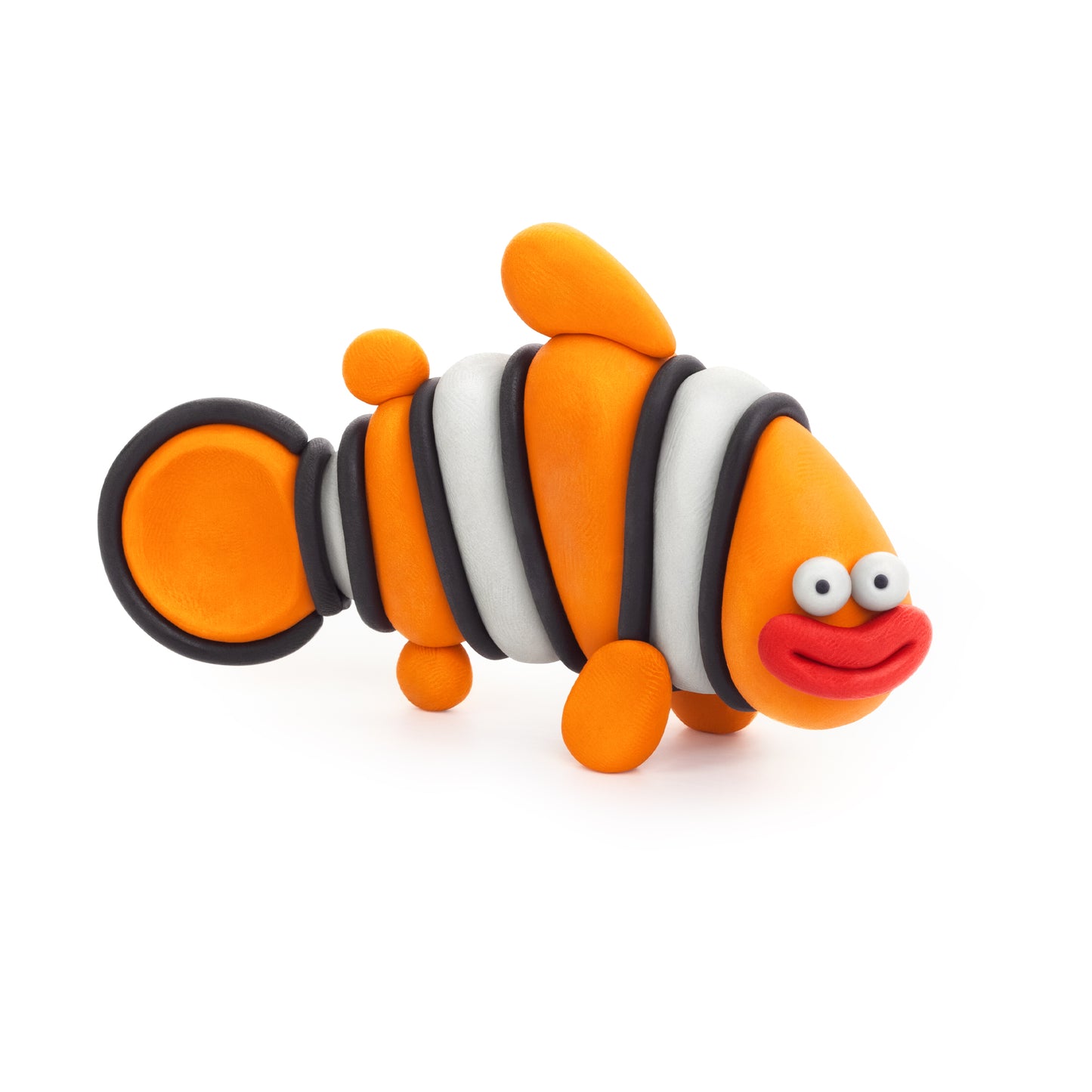Hey Clay clownvis met zwart-oranje strepen: vrolijke oceaandier gemaakt van veelkleurige boetseerklei