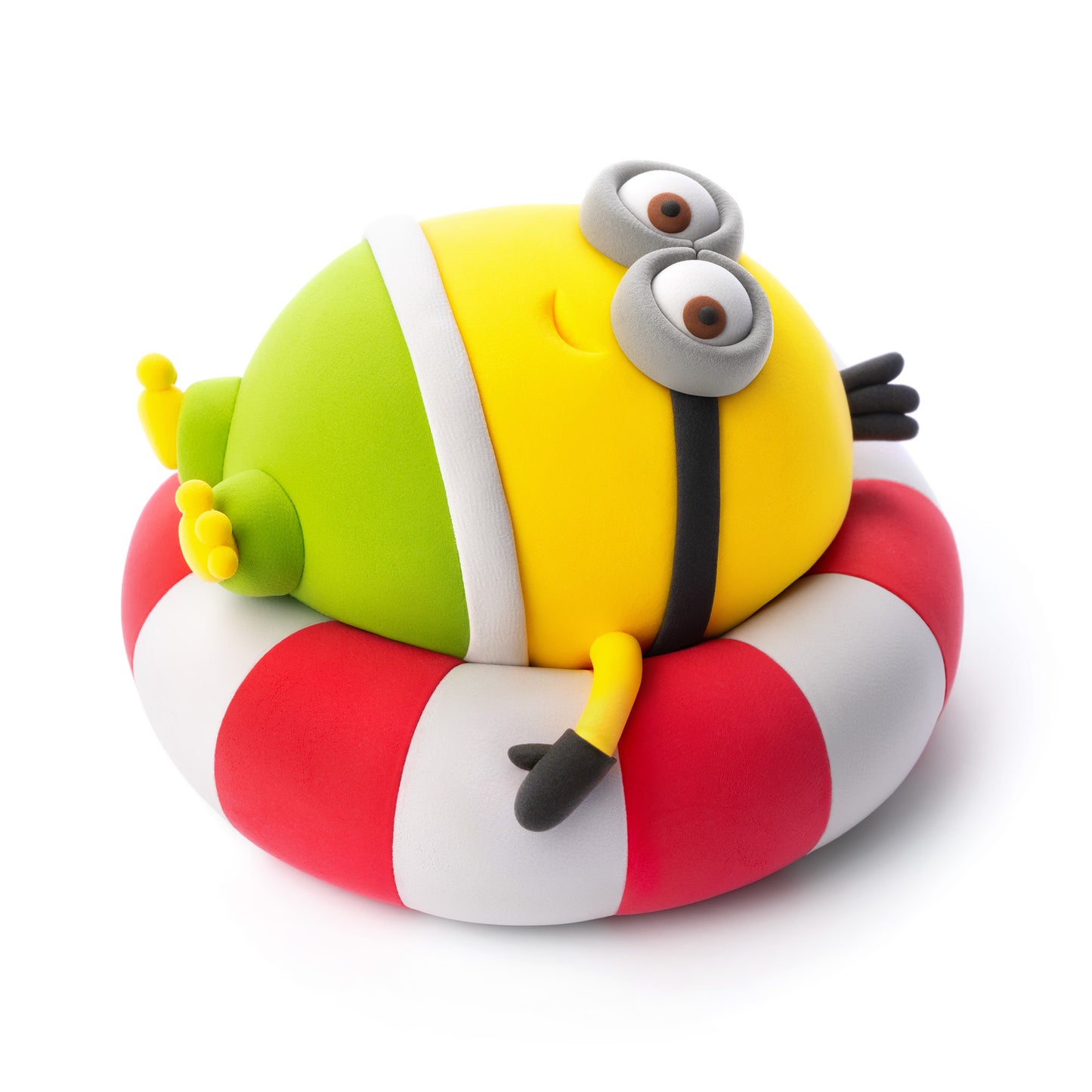 Hey Clay Minion Otto relaxend op rood-witte zwemband, kleurrijk kleifiguur als speelgoed vanaf 3 jaar