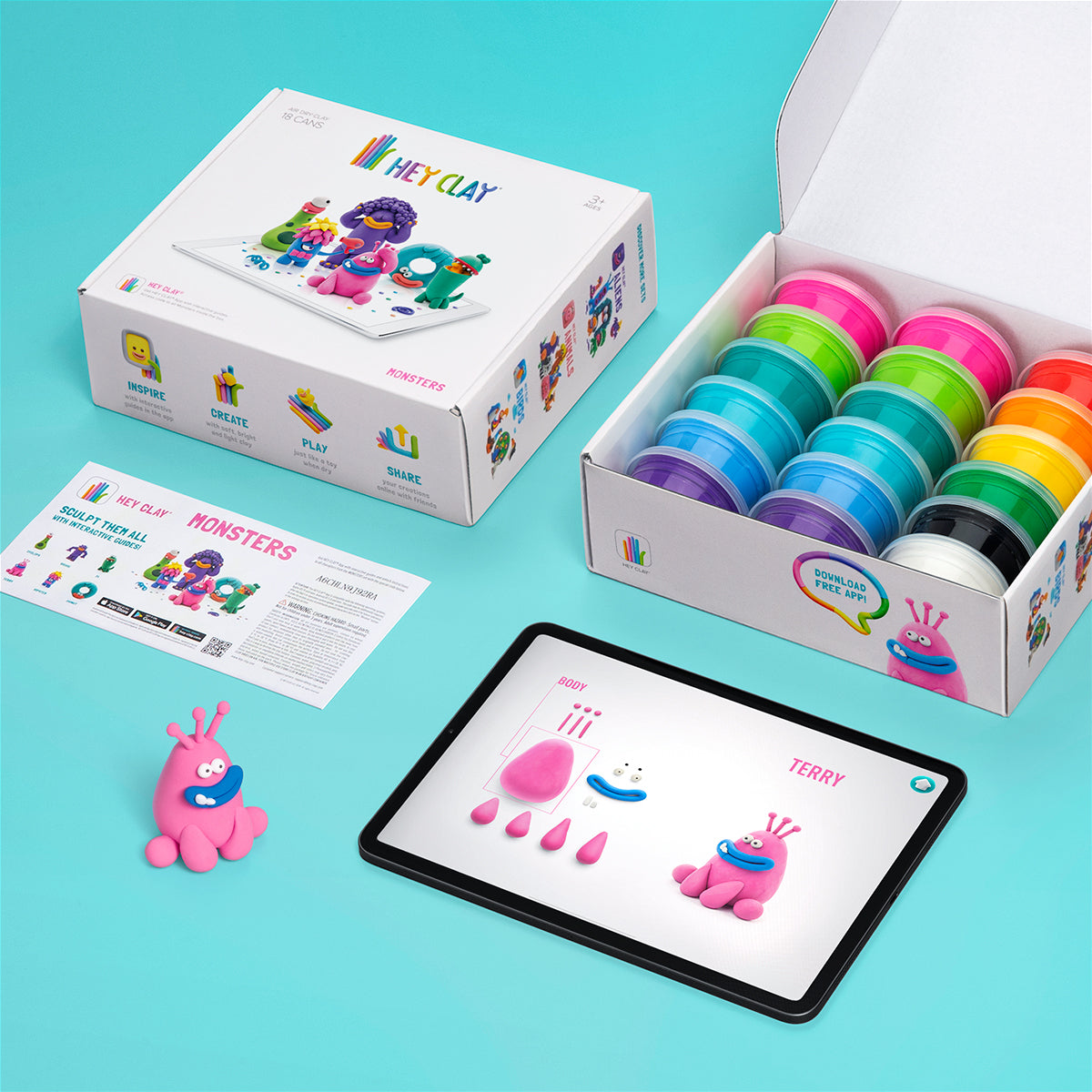 Hey Clay Monsters complete inhoud bovenaanzicht: verpakking, 15 potjes boetseerklei, instructies en tablet