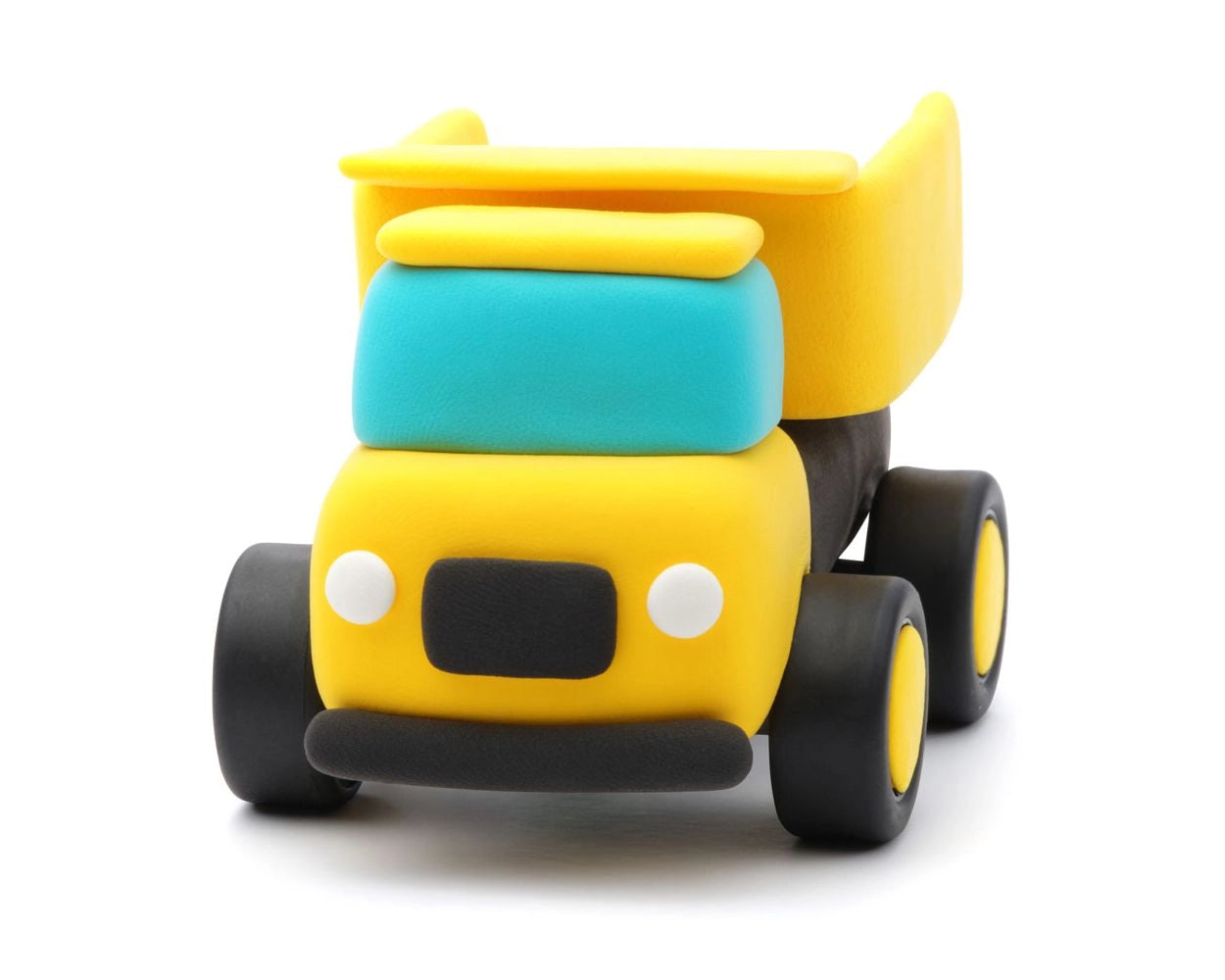 Gele vrachtwagen van Hey Clay boetseerklei uit de Motors Construction Vehicles set, creatief en educatief speelgoed voor kinderen.