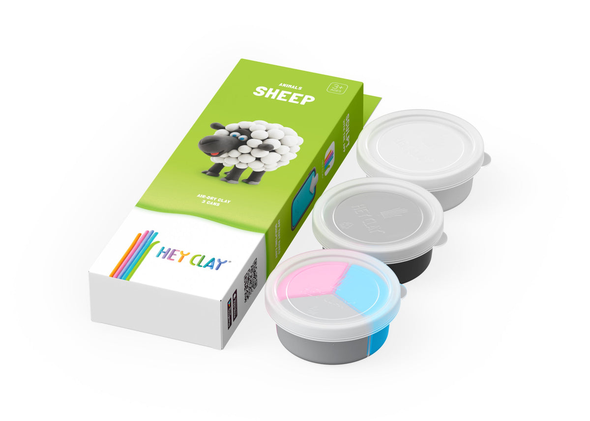 Hey Clay schaap boetseerklei set met 3 potjes klei in wit, grijs en blauw naast groene verpakking