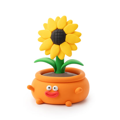 Hey Clay zonnenbloem van klei in oranje potje met vrolijk gezicht, detail foto bloem knutselen product