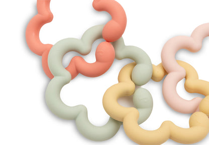 Bovenaanzicht Jollein bijtring baby bloem vormgegeven speelgoedringen in pastelkleuren