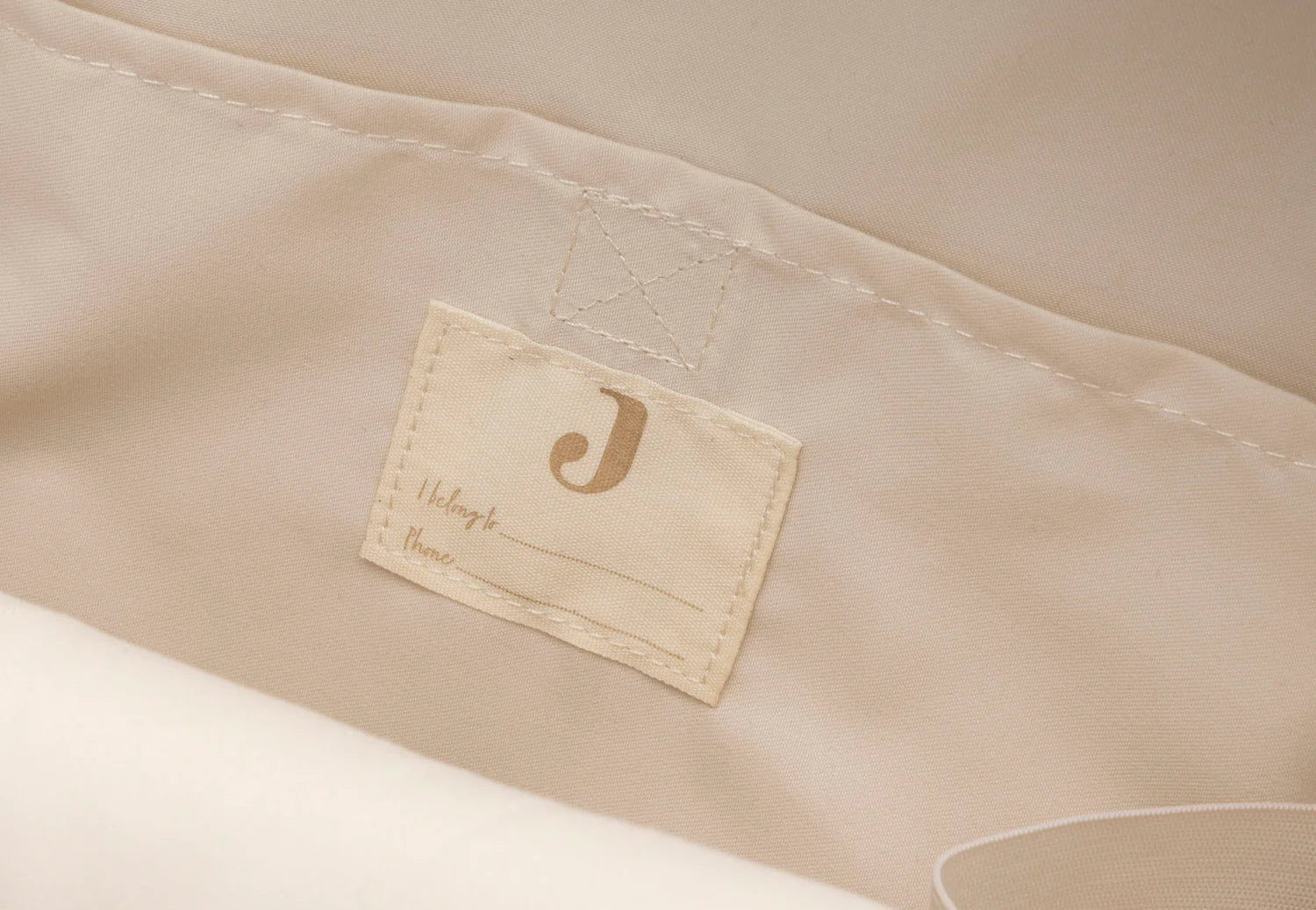 Kinder rugtas binnenzijde met Jollein label en naamvakje voor personalisatie in beige