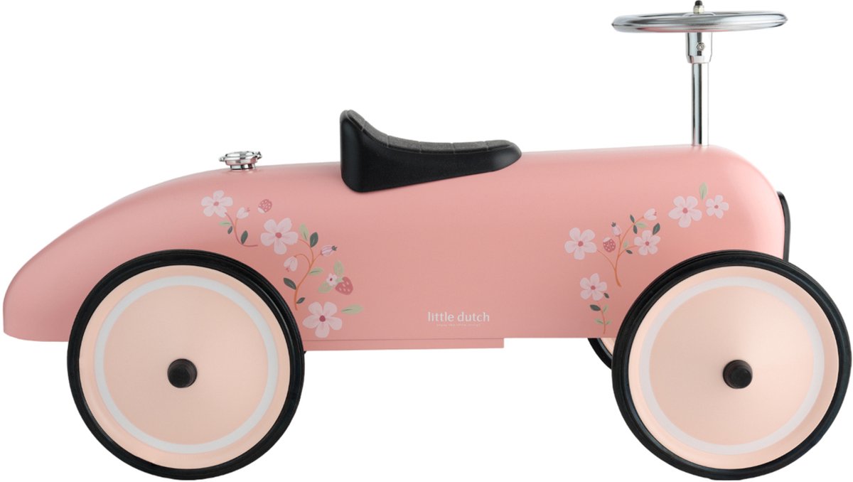 Loopauto Little Dutch roze profielaanzicht met bloemendecoratie en zwart lederen zadel