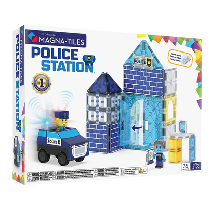 Voorzijde verpakking van de 35-delige Magna Tiles Police Station set met magnetisch politiebureau, auto en figuren.