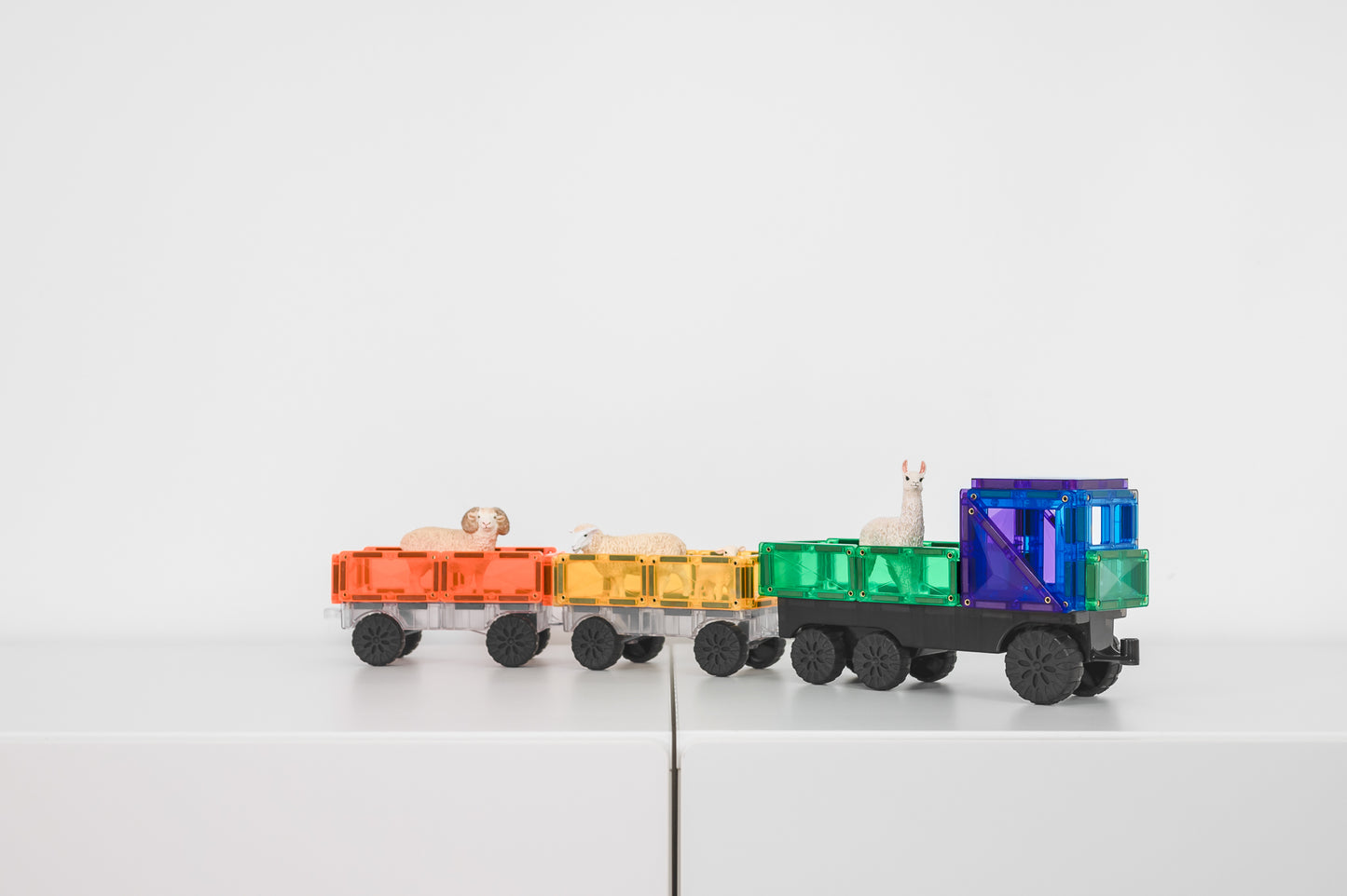Connetix Rainbow Transport Pack 50pc met dierfiguren in kleurrijke magnetische tegels aanhangwagens