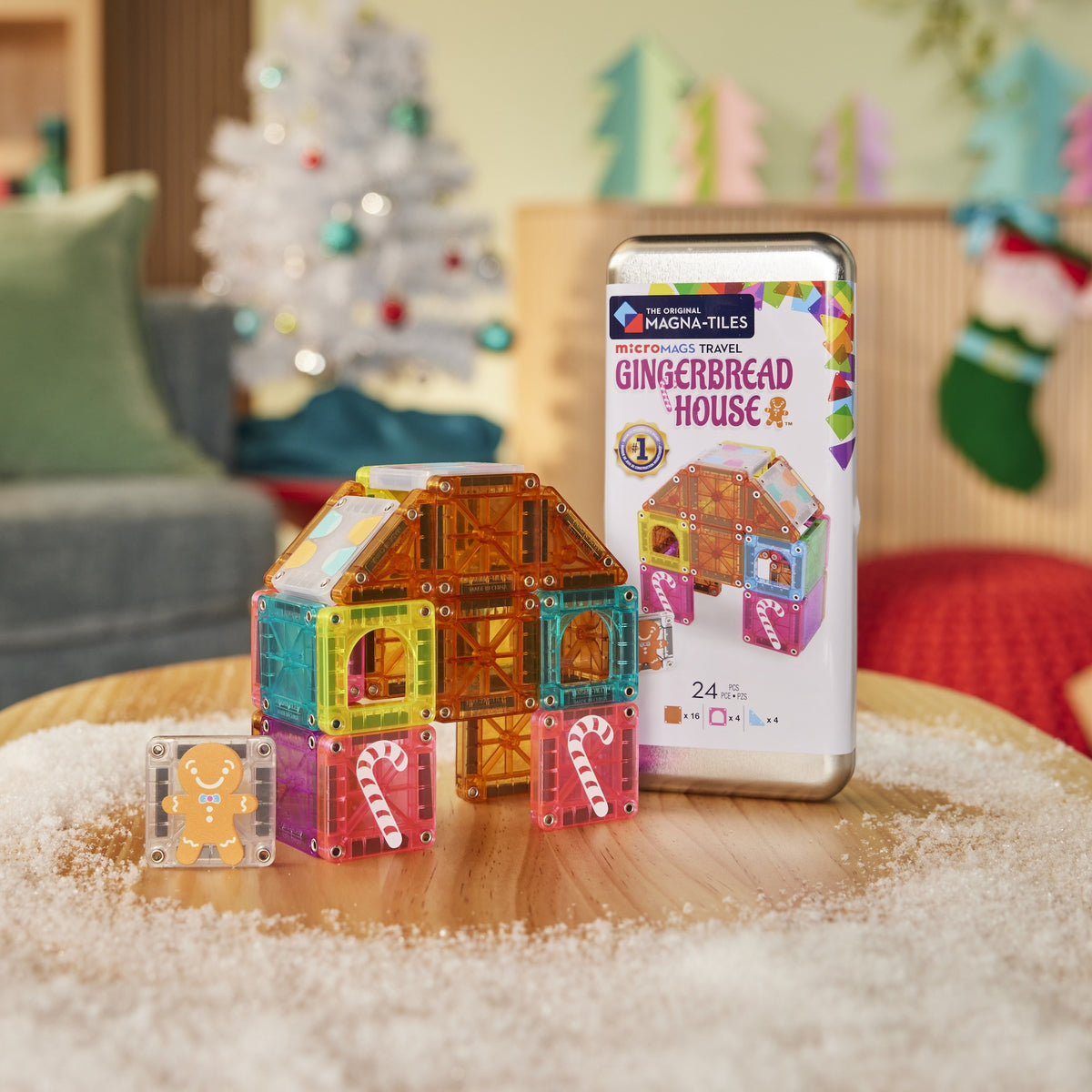 Magnetic Magna Tiles Gingerbread kerst speelgoed set met peperkoekhuis en verpakking op houten tafel