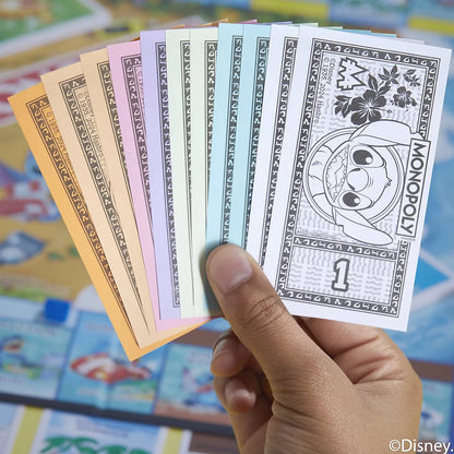 Monopoly Stitch Disney speelgeld van Hasbro in verschillende kleuren met afbeelding van Stitch.