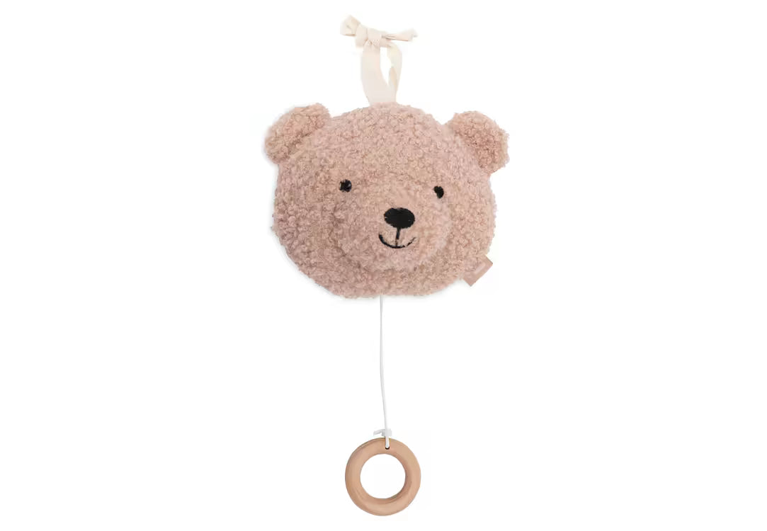 Vooraanzicht van het Jollein muziekdoosje Teddy bear in Wild Rose, een schattig muziekdoosje baby met houten ring.