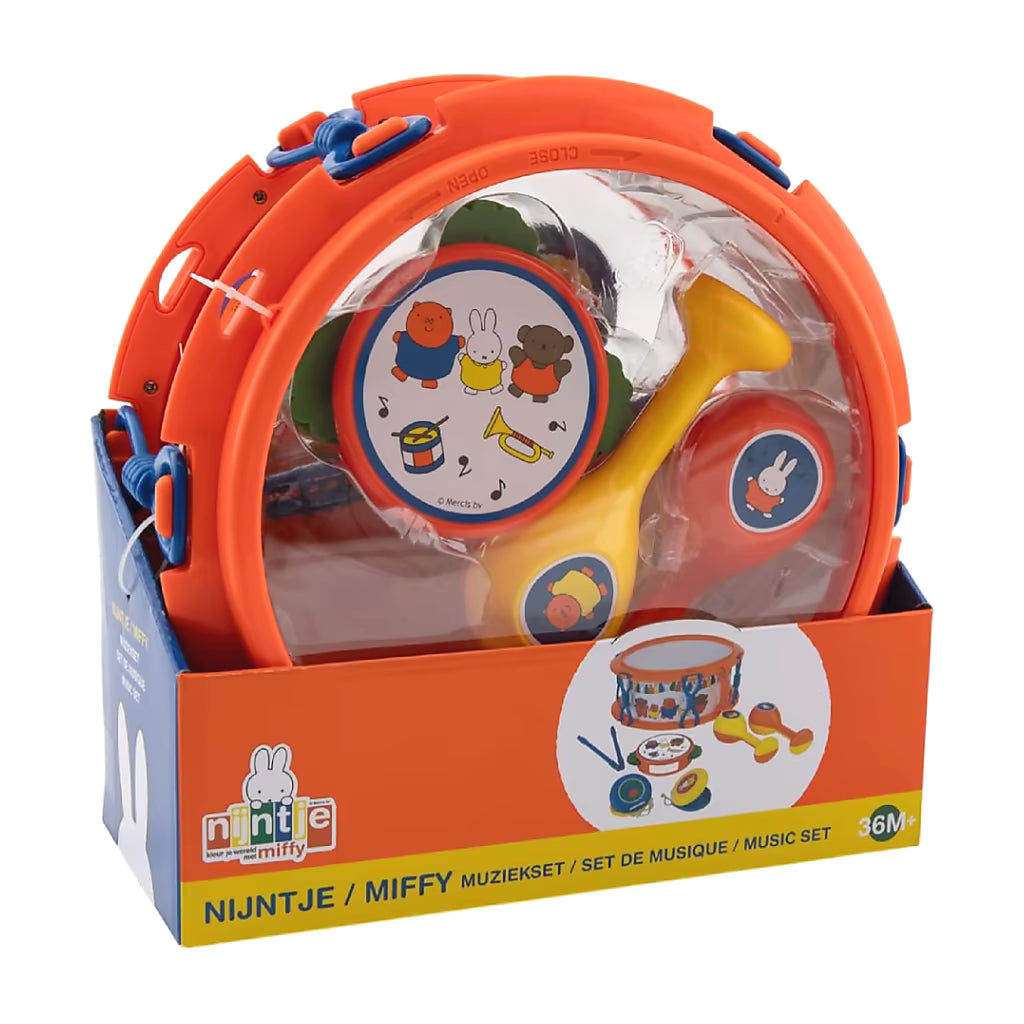 Nijntje Muziekset uitgepakt met drum, tamboerijn, sambaballen en castagnetten, kleurrijk muziek speelgoed.