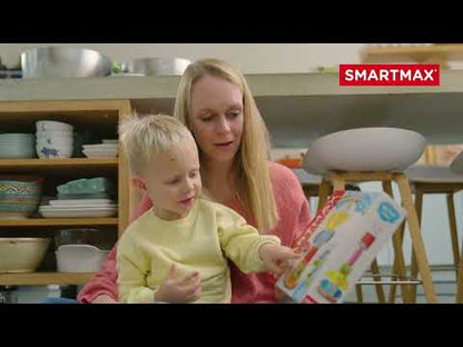 Kind speelt op de vloer met SmartMax My First Totem SMX 230 en bouwt een gekke totem van magnetisch speelgoed