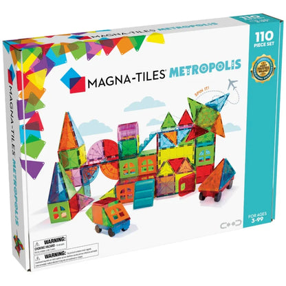 Voorzijde doos met Magnetic Magna Tiles Metropolis Set, met 110 gekleurde heldere magnetische bouwstenen, vanaf 3 jaar.